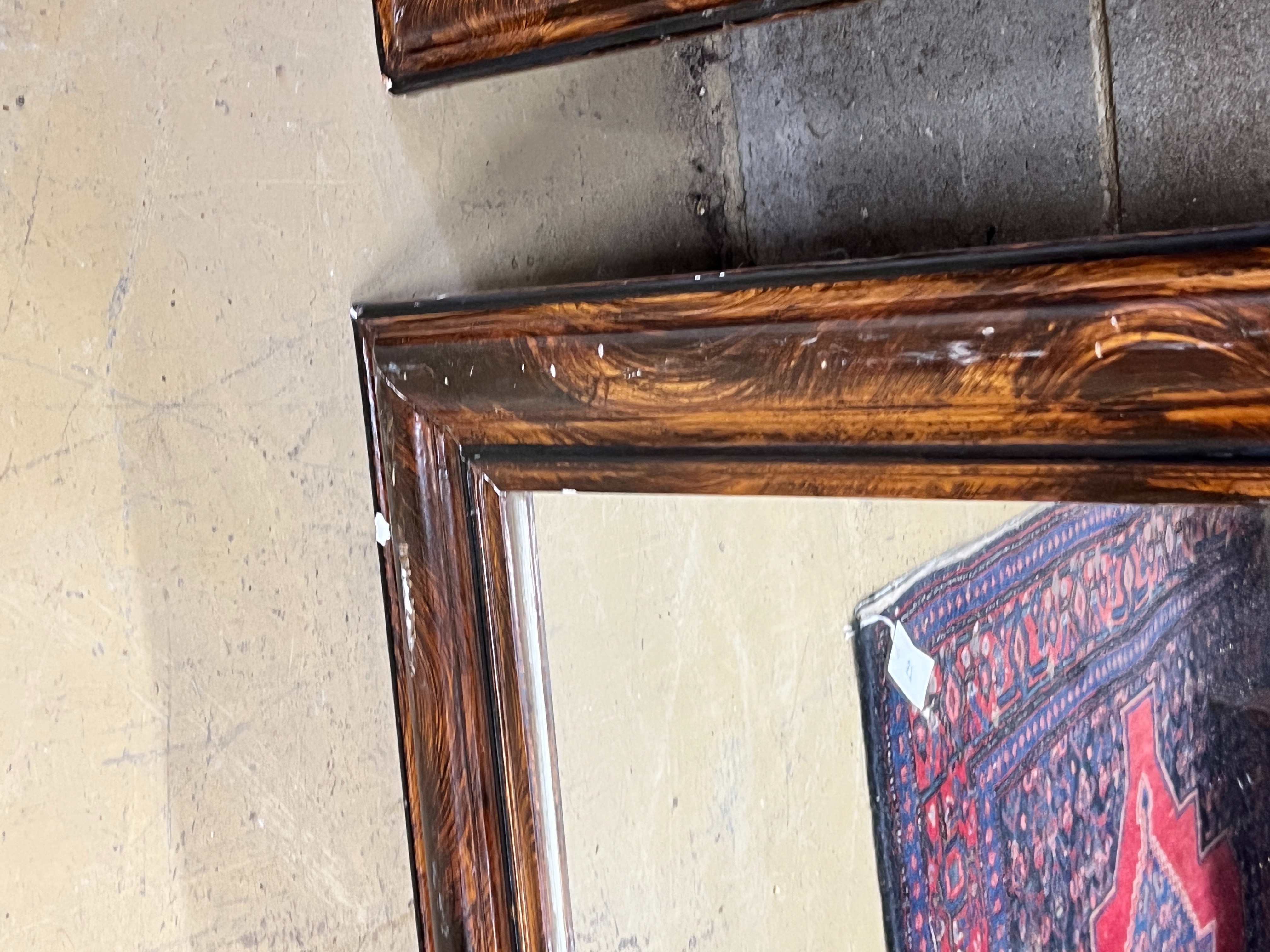 A pair of Victorian wall mirrors with painted simulated grain, width 60cm, height 81cm